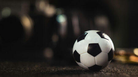 Black and white soccer ball on the field